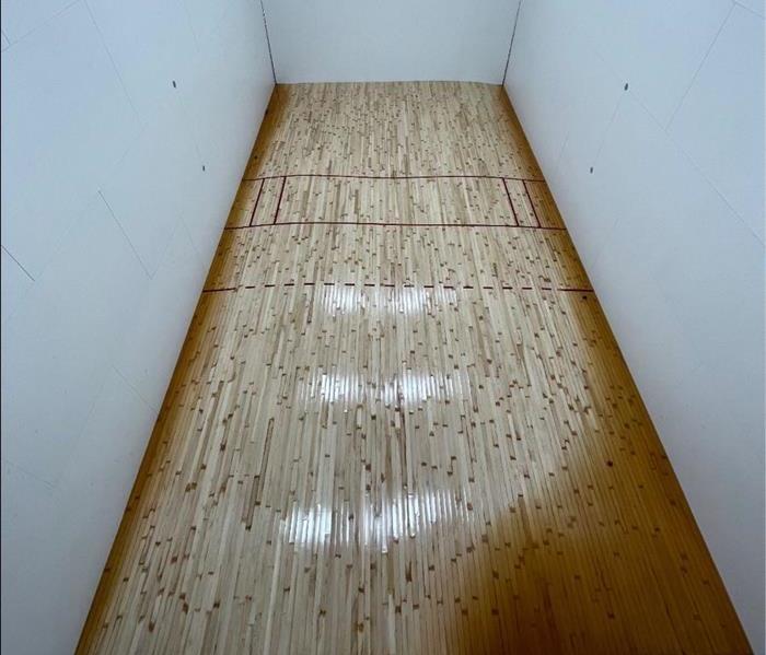 Flooded racquetball court