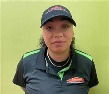 Female employee in a black shirt