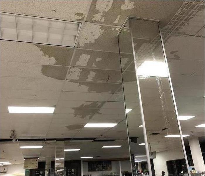 Wet ceiling tiles in a department store